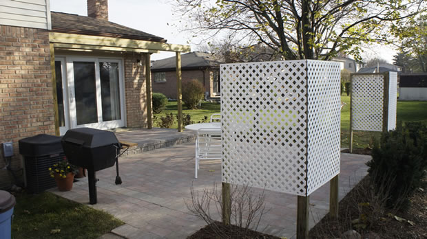 Clinton Twp, MI:  Natural Stone / Brick Paver Design Ideas for Small Patios